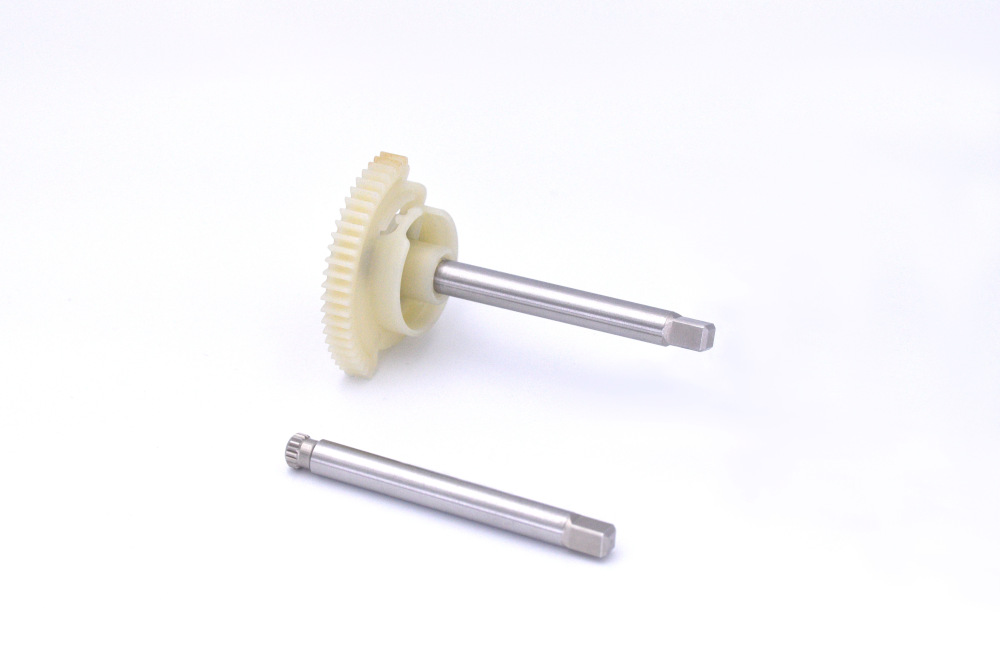 output shaft axe denture surmoulee